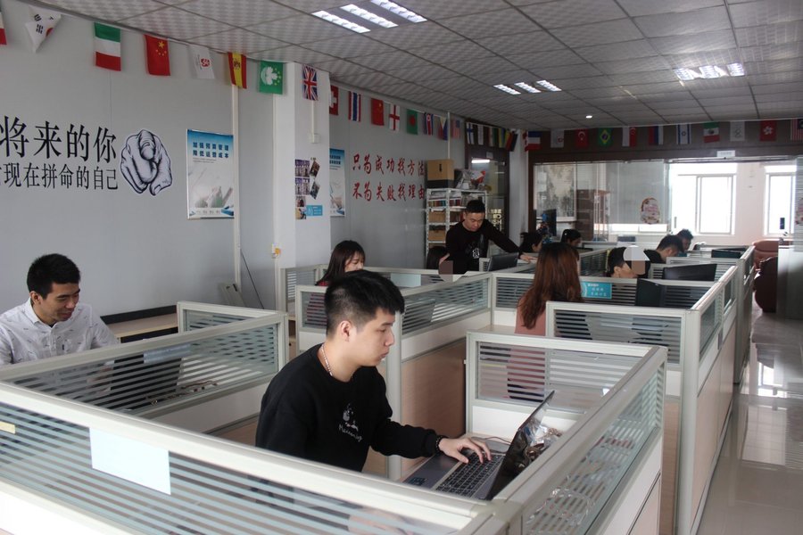 Angel Shoes office with international flags