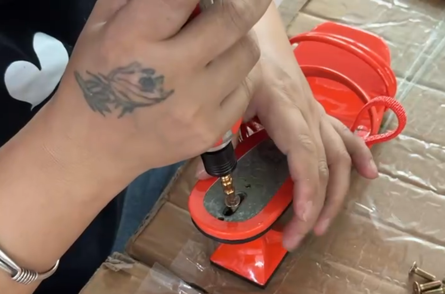 Hardware attachment for sandal straps at the workshop